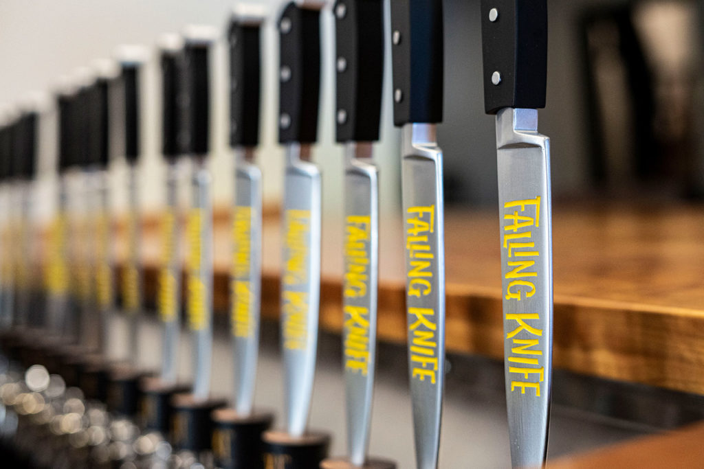 Falling Knife Brewing Co. tap handles closeup